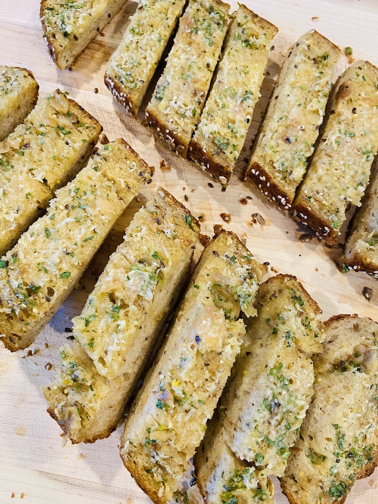 Roasted garlic bread with cheese topping
