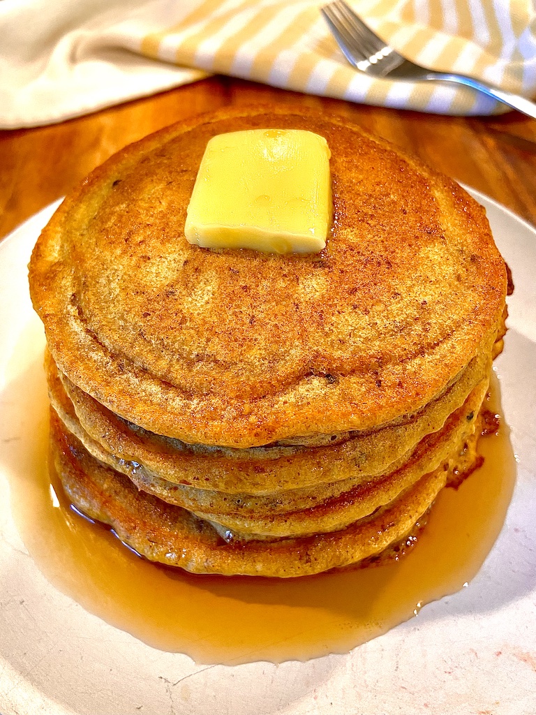 Pumpkin pancakes with butter and maple syrup