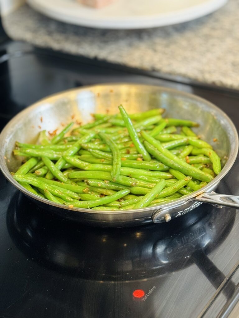 end, finished garlic green beans in the same pan