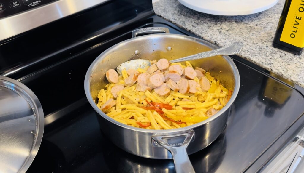 sausage and pasta together in the pan