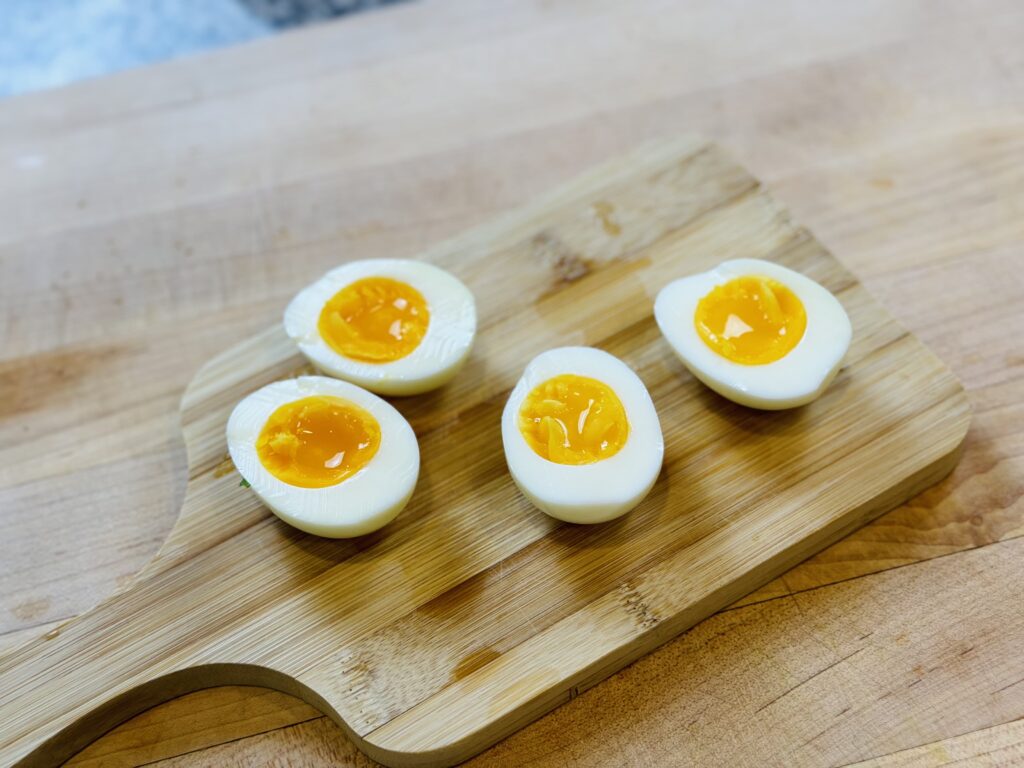 soft boiled eggs cut in half