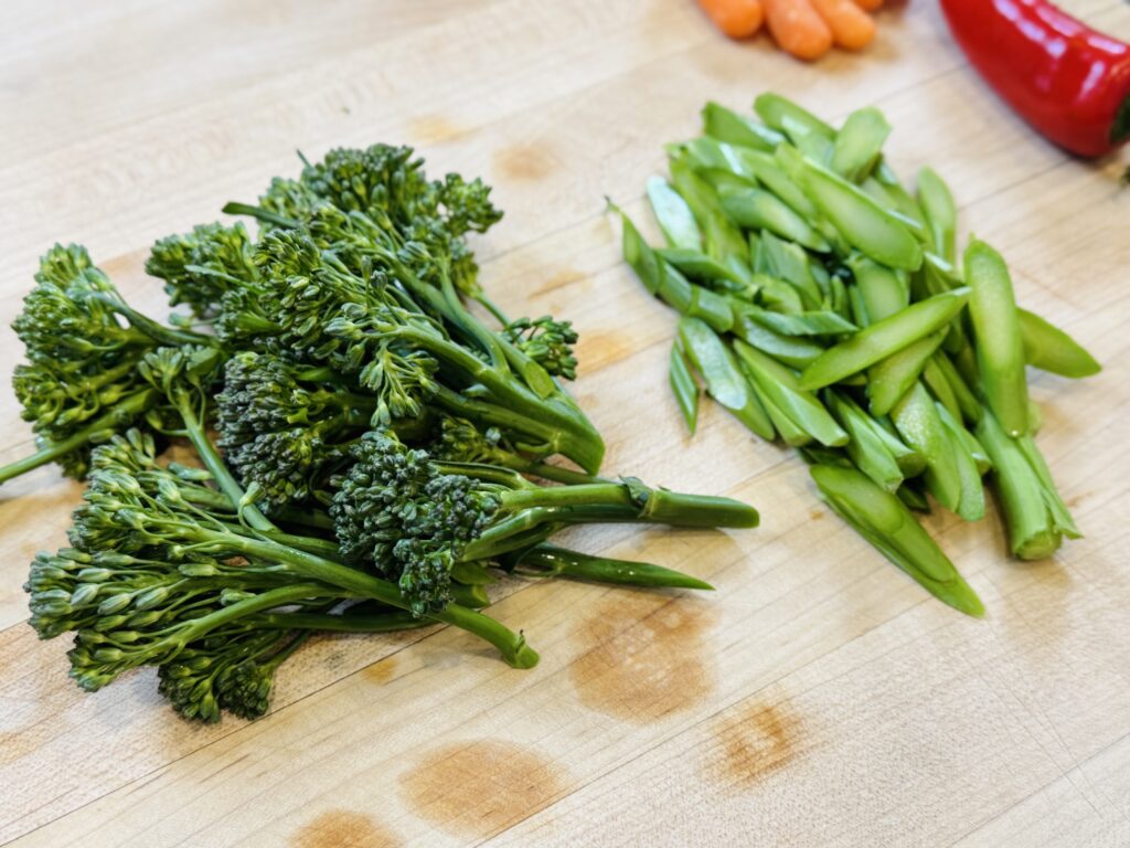 Sliced Broccoli, carrots and bell pepper on the sides
