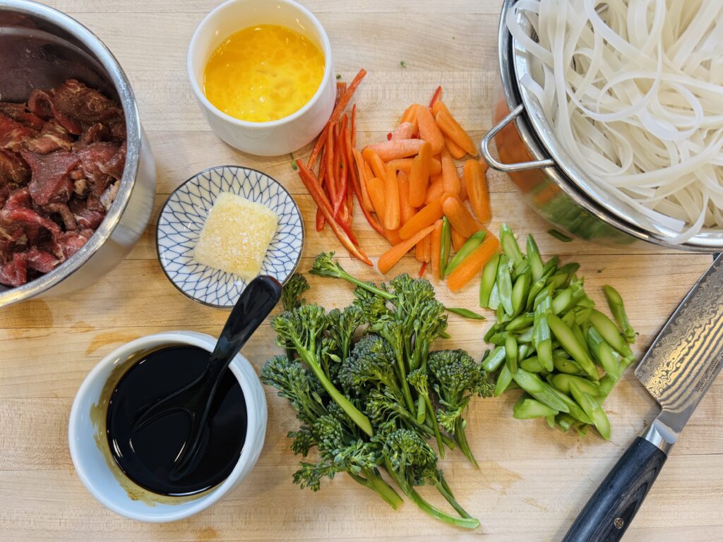 Top view shot of vegetables prep with other ingredients on the sides