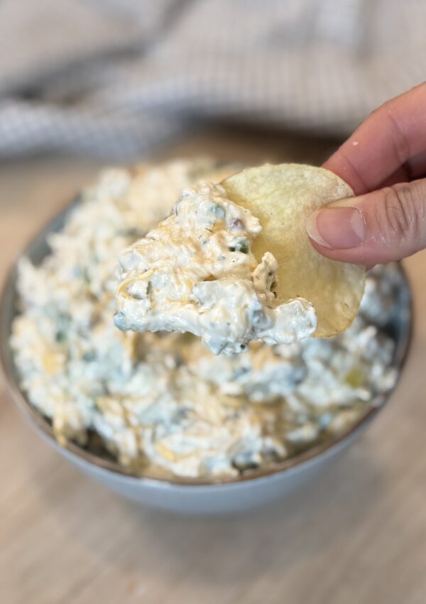 A shot of chip dipping on the Pickle dip.