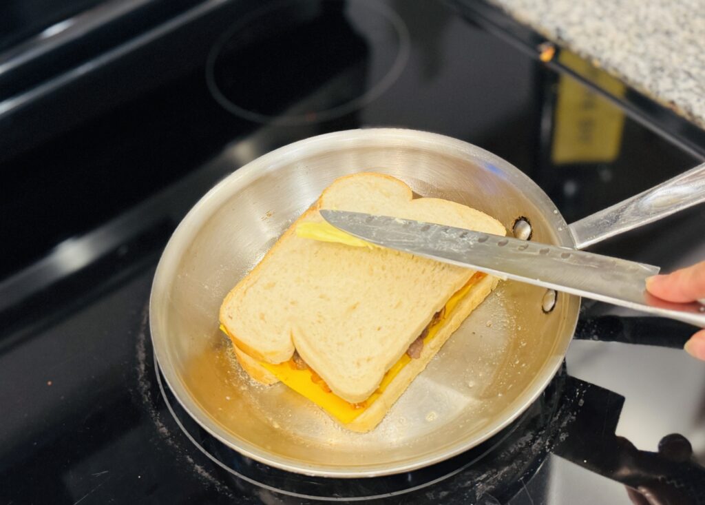 Final layer of butter being slathered over the top of the bread